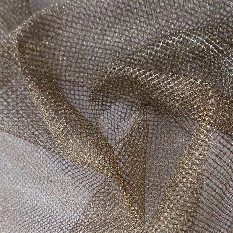 mesh fabric gold and black metallic mixers|Fabric by Collection .